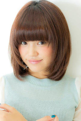 Layered cut on Graduation cut with Mash bangs is cute.