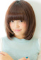 Layered cut on Graduation cut with Mash bangs is cute.
