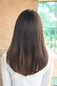 Sleek texture of hair is excellent for A line long hair style. back